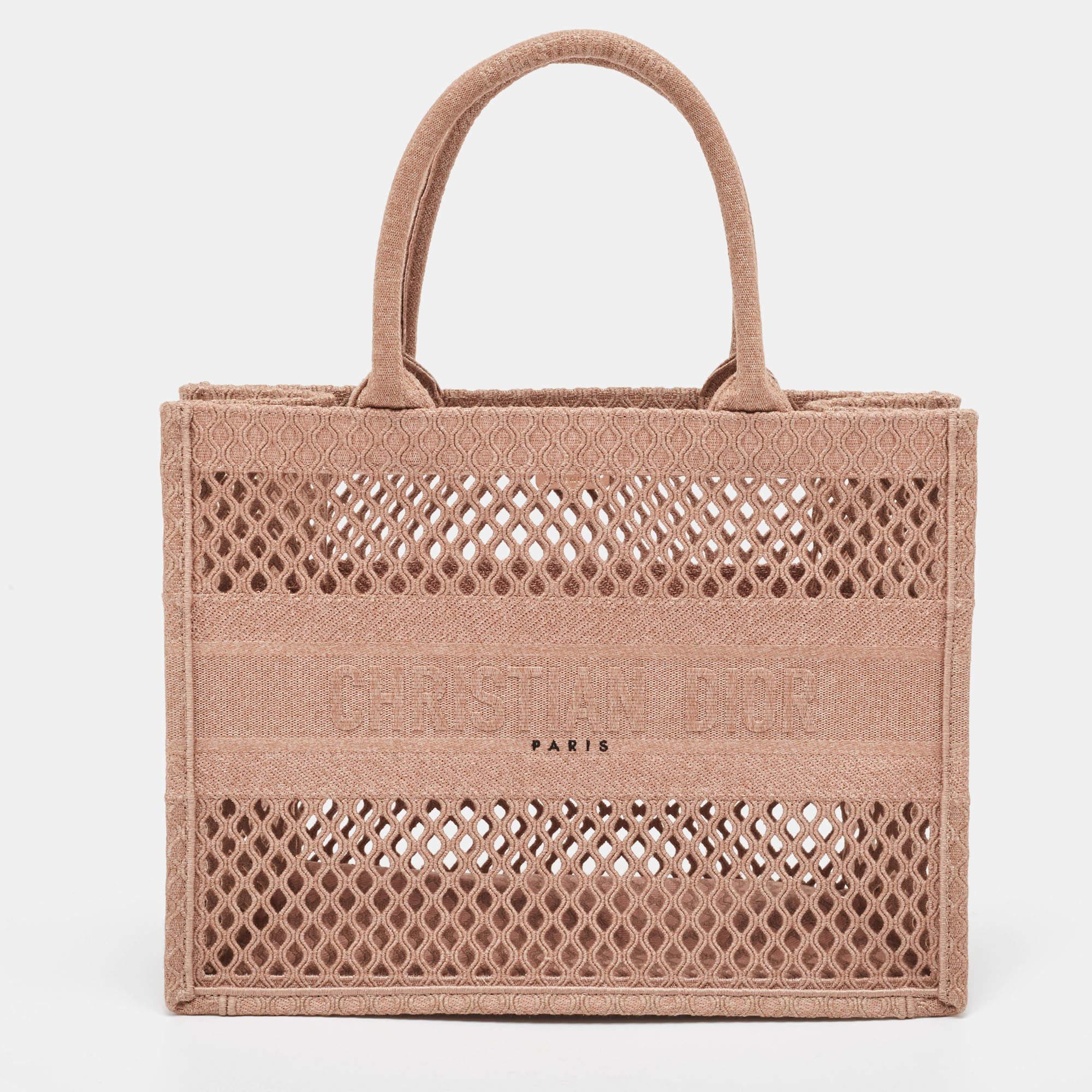 Carry everything you need in style thanks to this Dior Book tote. Crafted from the best materials, this is an accessory that promises enduring style and usage.

Includes: Original Dustbag, Authenticity Card, Info Booklet

