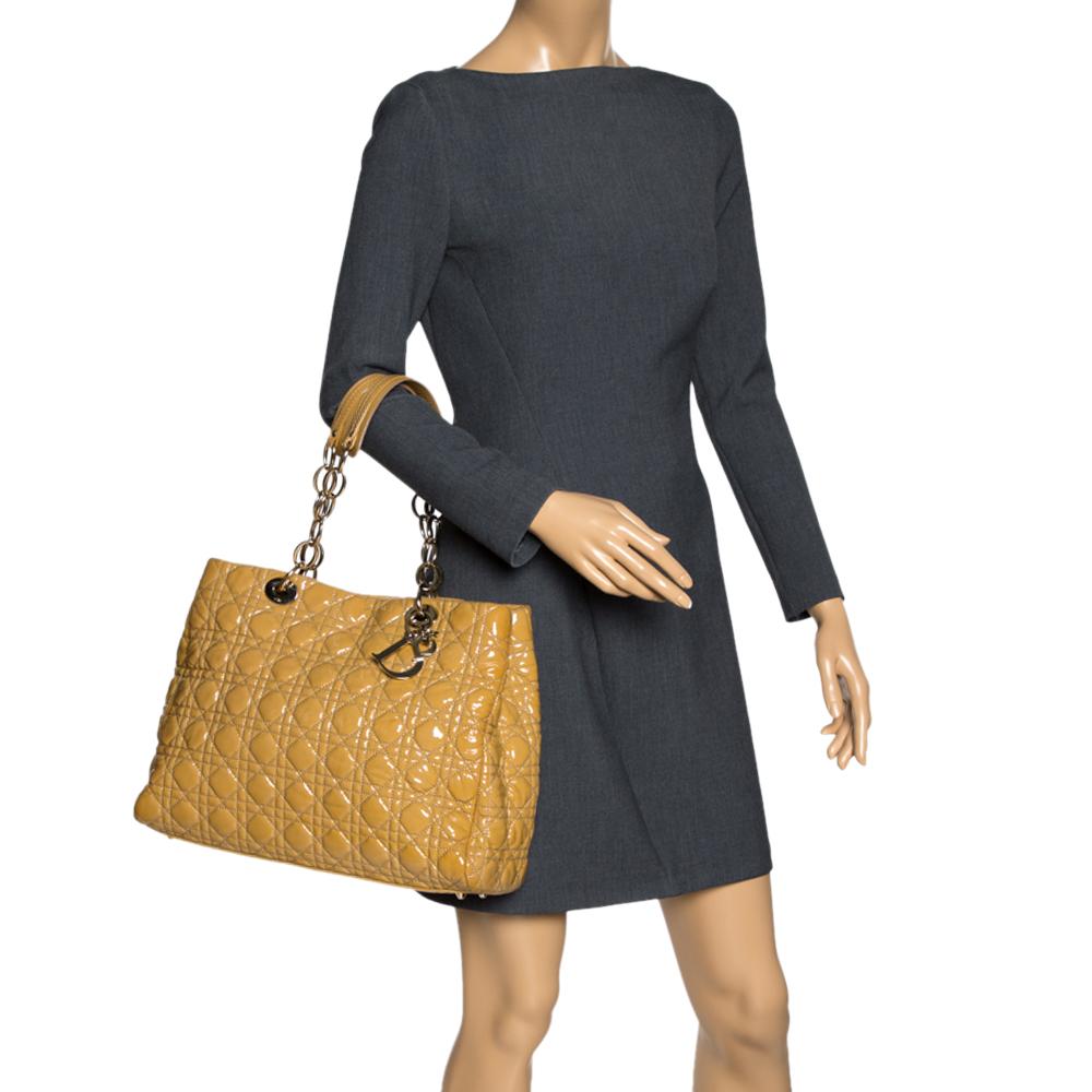 cream patent handbag