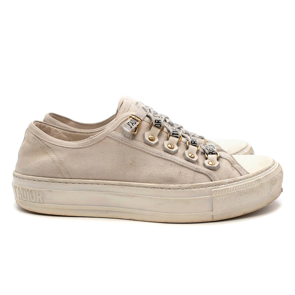 Dior Cream Canvas Walk'n'Dior Lace Up Sneaker 

- Cream canvas signature Walk'n'Dior lace up style 
- Christian Dior 'J'Adior' signature on sole and laces
- Leather inserts and antique gold-finish metal accessories
- Rubber sole with star, Christian