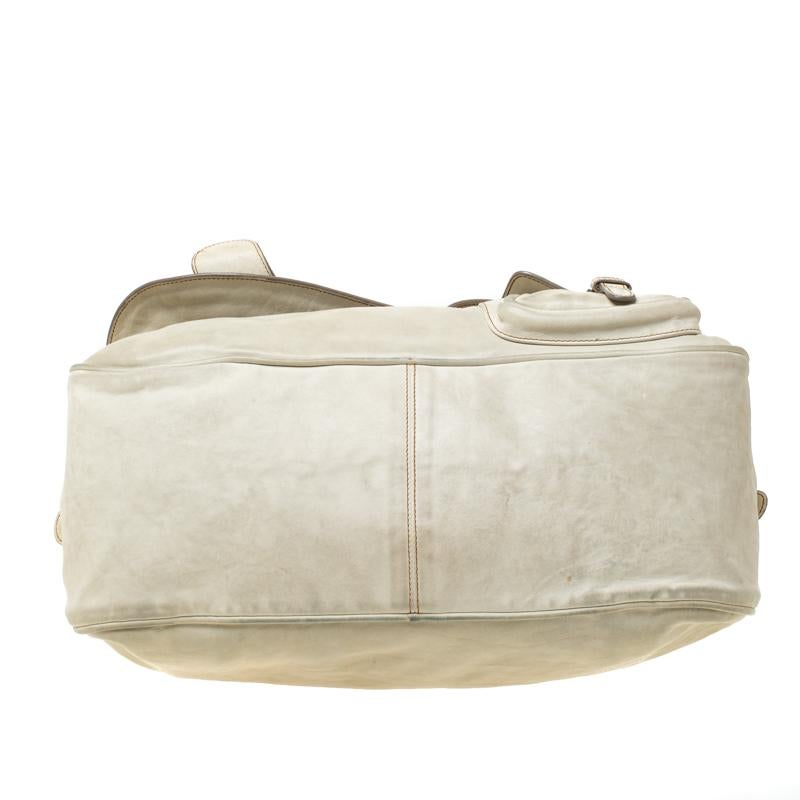 cream dior saddle bag
