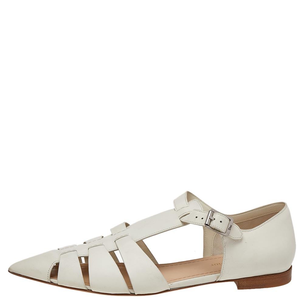 These cream-hued sandals by Dior are absolutely stunning. They are crafted from quality leather and are perfect for a day out. They feature pointed toes, strappy vamps, and sturdy soles. They are a pair that combines sophistication and comfort