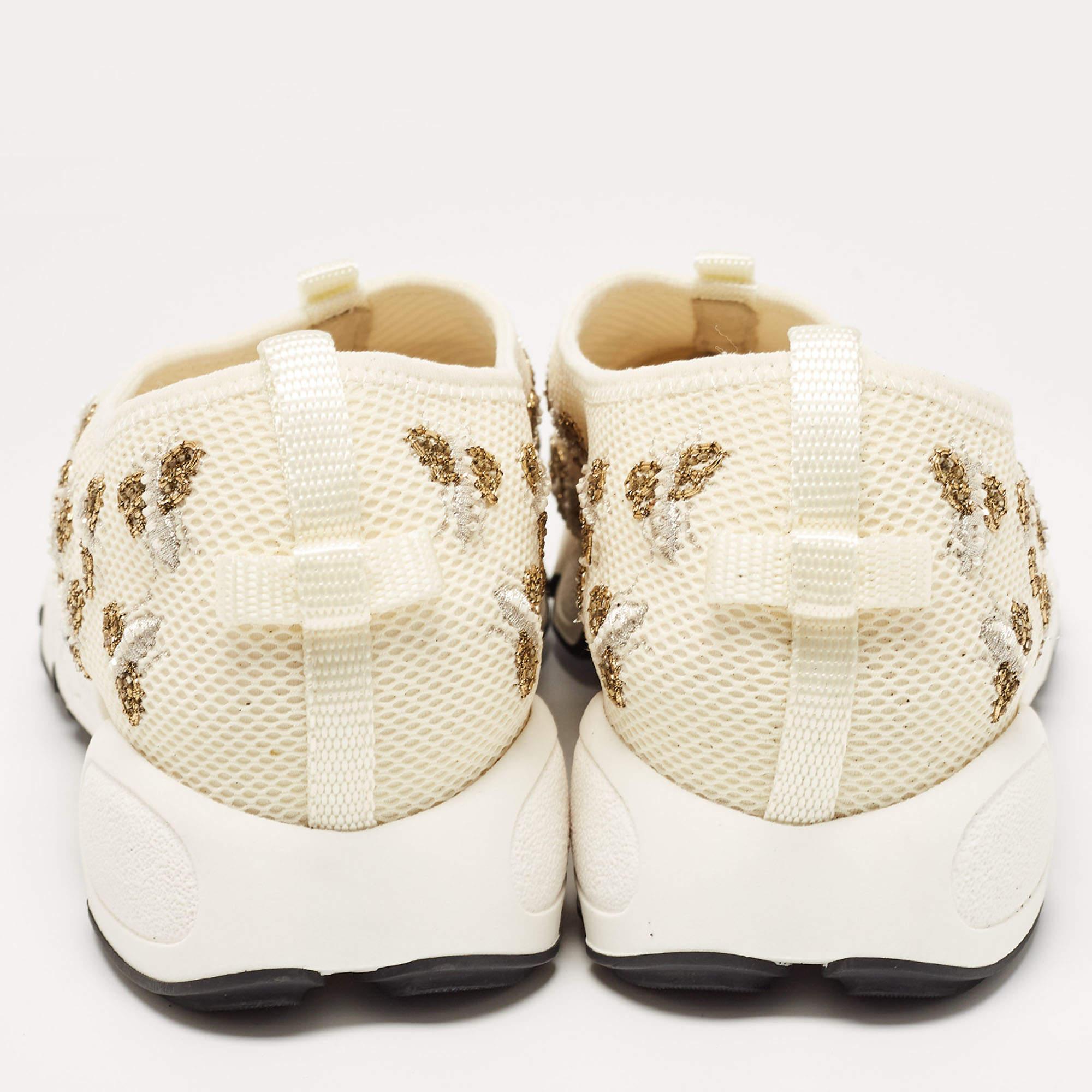 From the House of Dior, these sneakers are a beautiful creation that will elevate your style! They are made using mesh on the exterior with intricate embellishments highlighting their sturdy structure. They feature a low-top manner. Comfortable and