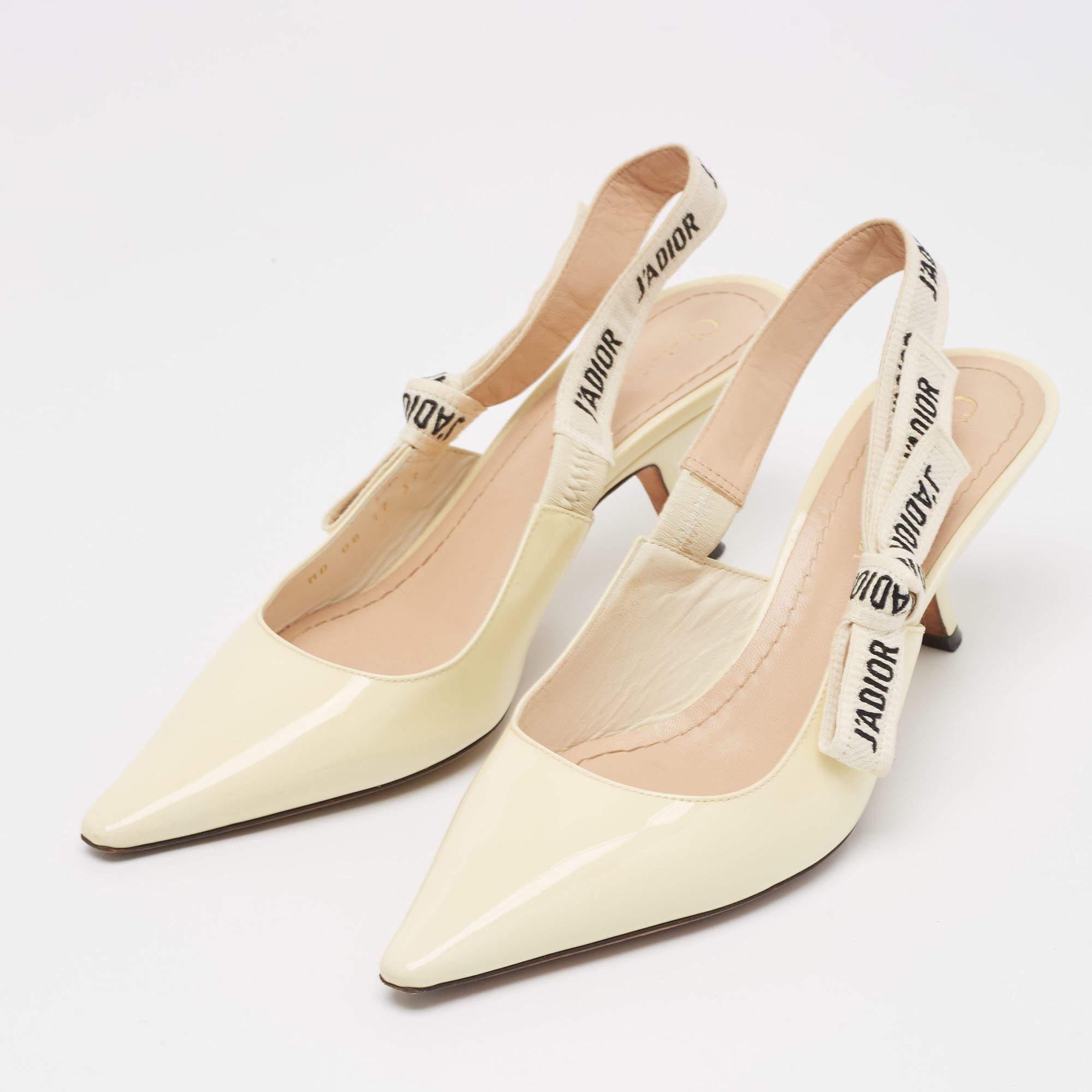 This pair of Dior pumps celebrates femininity like all other designs of the brand. Made from patent leather the creation is highlighted with a Jadior detailed slingback closure and the sharp silhouette is balanced on 5cm heels.