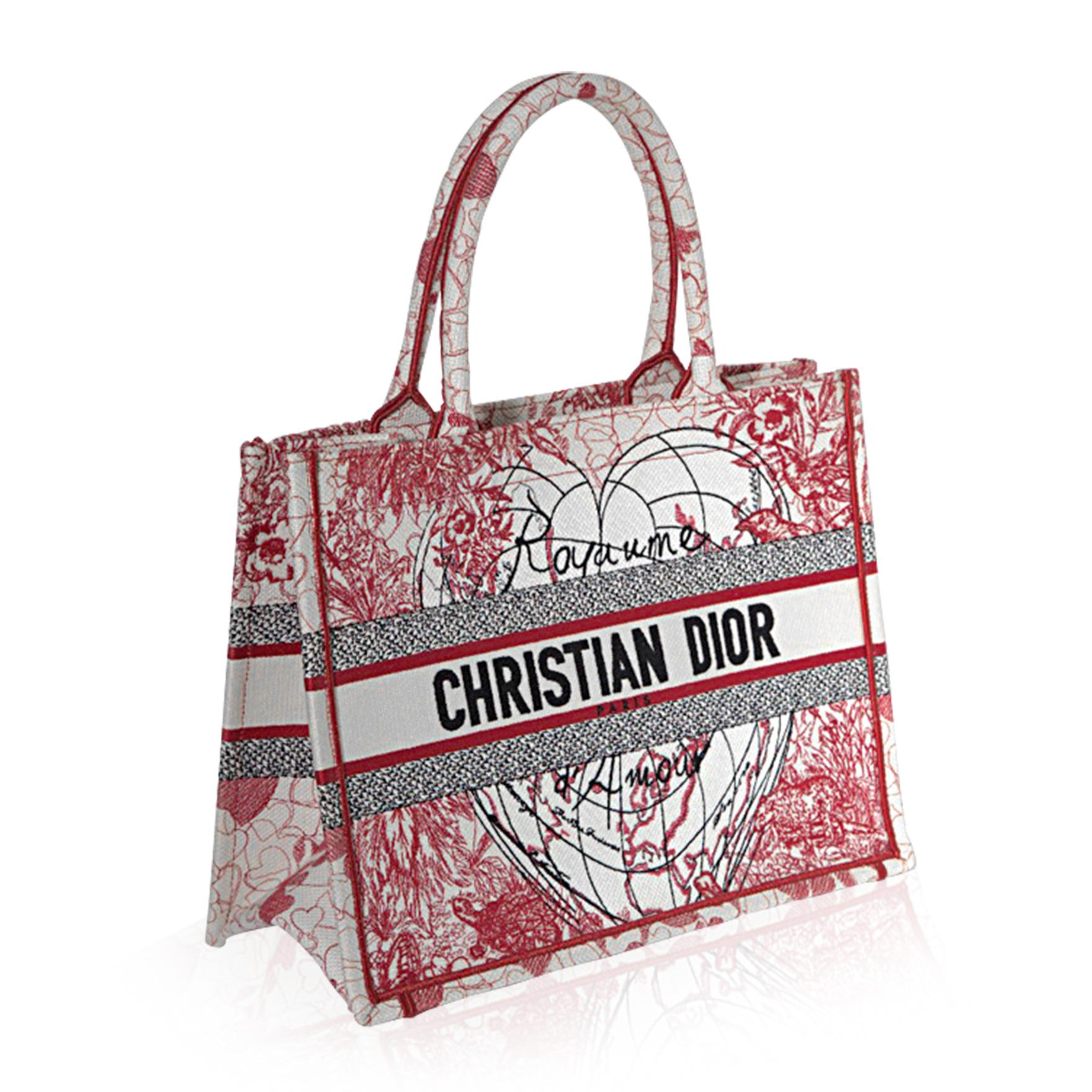 Created by Maria Grazia Chiuri, the Creative Director of Christian Dior, the Dior Book Tote is a key element of the Dior aesthetic.

The Christian Dior D-Royaume d’Amour Canvas Book Bag, from the Dioramour collection 2021, exudes a strong feeling of