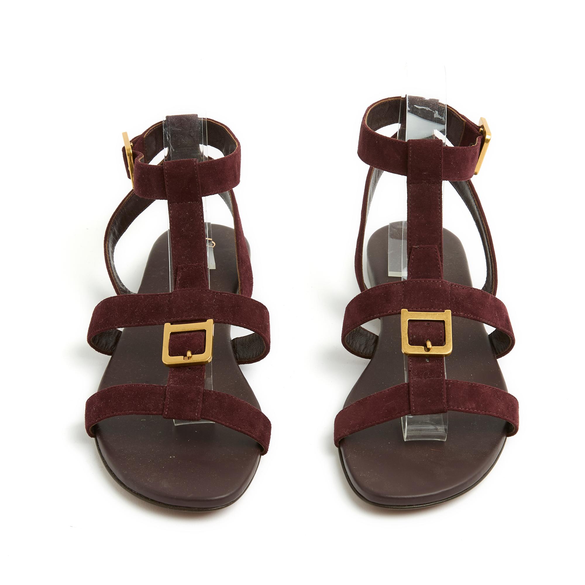 Christian Dior sandals in dark burgundy suede (or Amarante at Dior) with wide crossed straps, gold metal pin buckle closure. Size 39EU or 5US and US7.5, heel 1 cm, insole 24.5 cm. The sandals are perfectly new, beautiful on the feet...