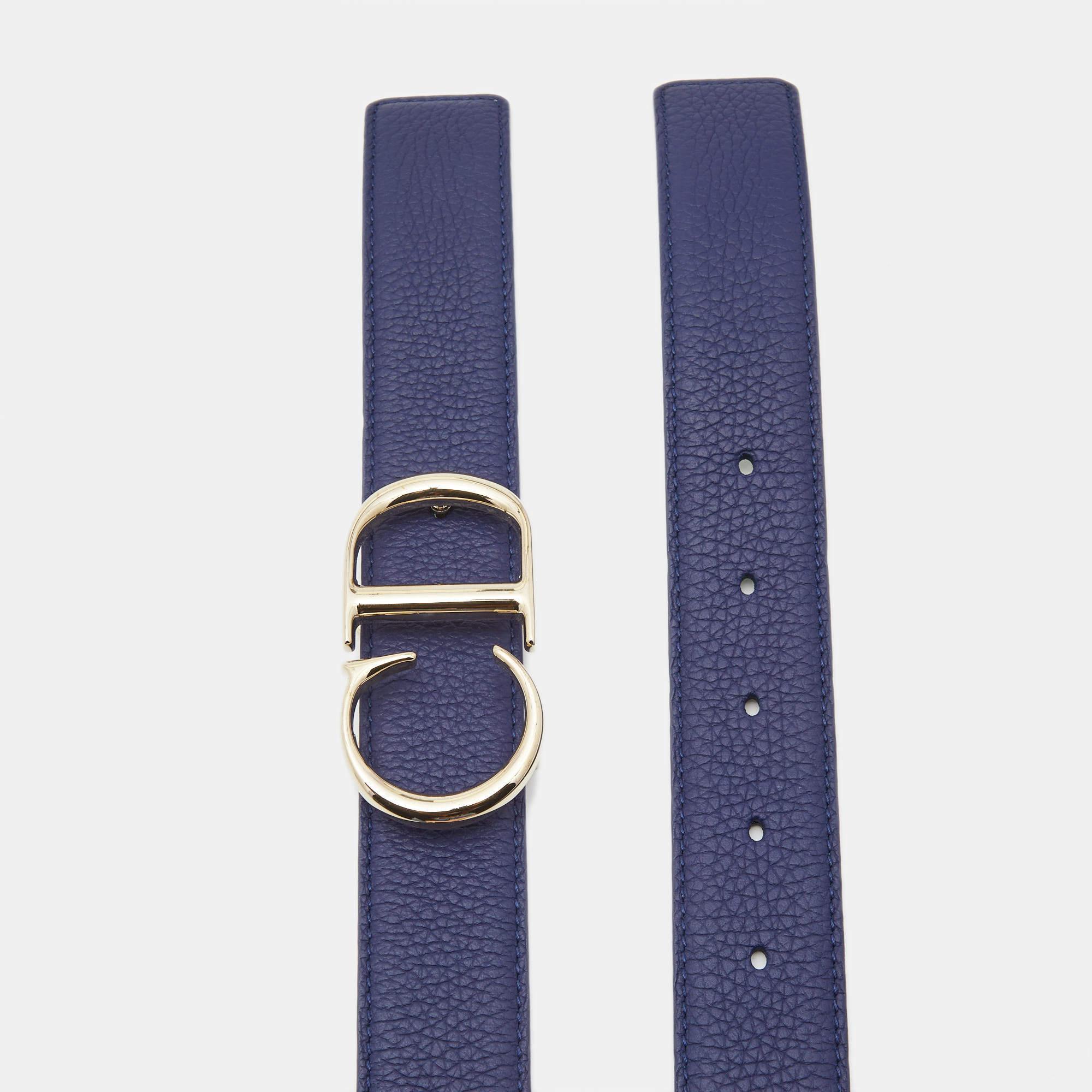 Arrive in style with this Dior CD logo belt. Displaying silver-toned hardware and leather, this belt consists of a single loop for fastening. Complete your ensemble with this belt to achieve a classy appearance.

Includes: Original Dustbag