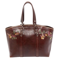 Dior Dunkelbraune römische Blumen-Tragetasche aus Leder
