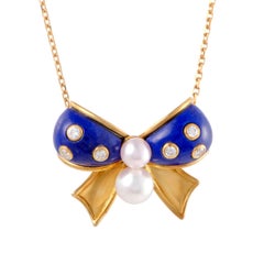 Dior Diamond and Pearl Blue Enamel Gold Bow Pendant Necklace