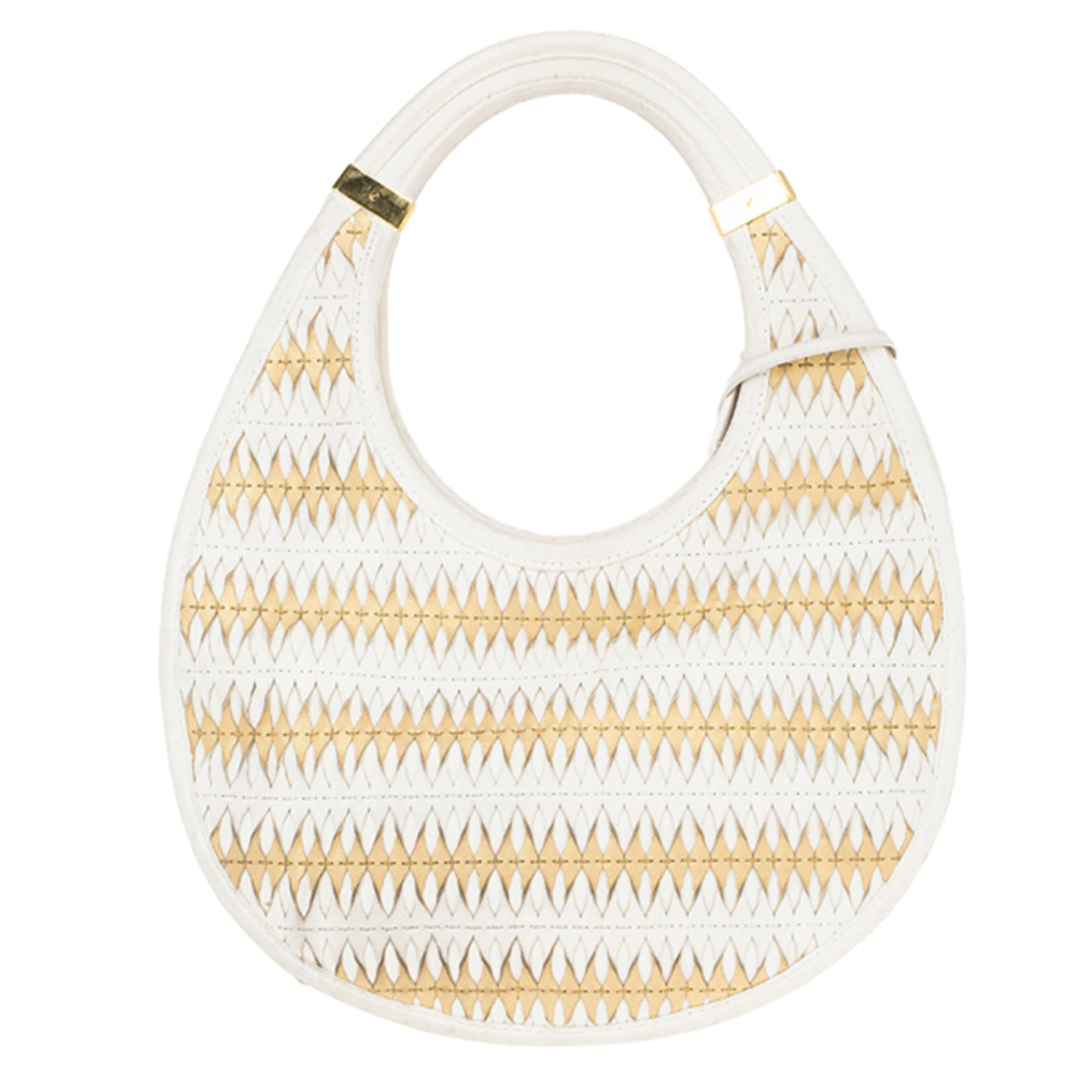 This Dior Diorita Contrast Twist Medium Hobo is definitely a collectors piece! It features woven white and beige leather and a Dior charm in gold-tone hardware. This hobo is lined with white canvas and features a single zip pocket. Add a statement