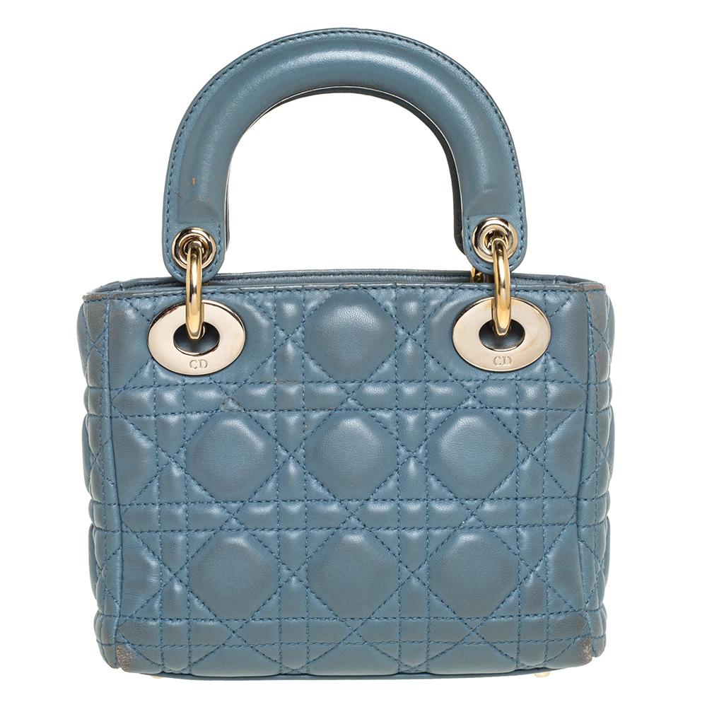 The Lady Dior tote is a Dior creation that has gained recognition worldwide and is today a coveted bag that every fashionista craves to possess. This dusk blue tote has been crafted from leather and it carries the signature Cannage quilt. It is