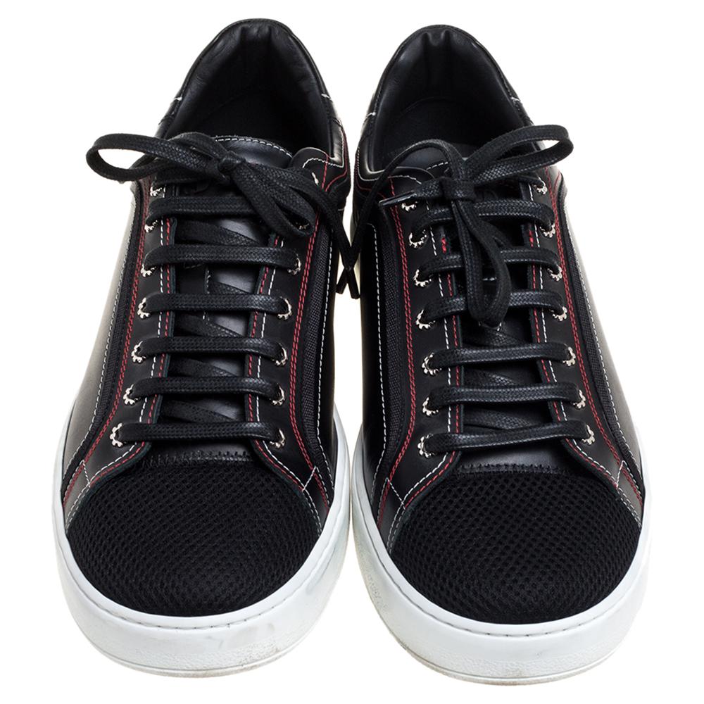 Classic in design and stylish in appearance, Dior's sneakers for men, are brimming with high quality. Crafted from leather, fabric, and nubuck, they feature laces on the vamps, round toes, and stitching details.

Includes: Original Dustbag, Original