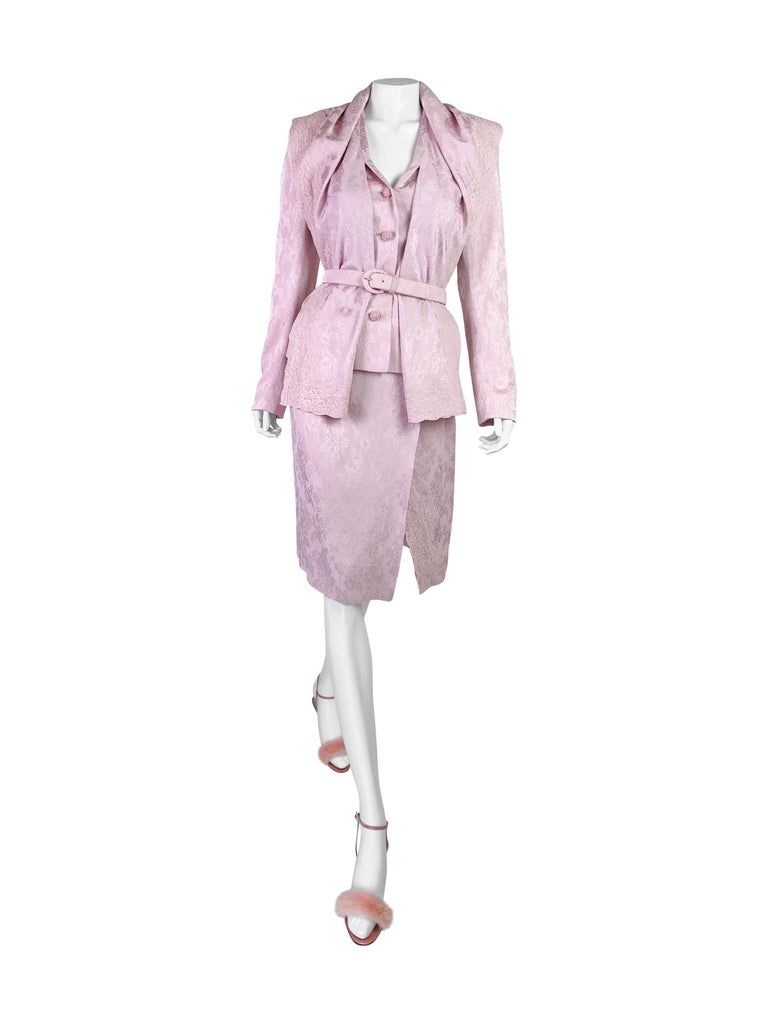 A stunning example of early John Galliano’s years at Dior! This fabulous suit is from a soft, delicate jacquard with 100% silk lining.

Size FR38. Measurements (flat lay on one side):

Jacket shoulder to shoulder - 40 cm (15,7 in)
 Jacket armpit to