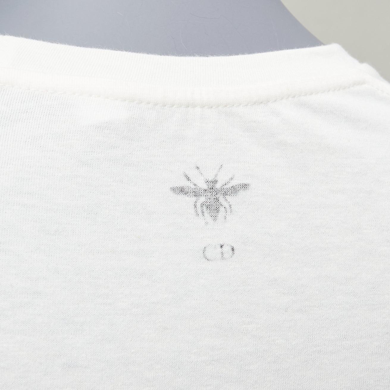 DIOR Feminity The Trap Simone De Beauvoir print white cotton linen tshirt XS
Reference: AAWC/A00783
Brand: Dior
Designer: Maria Grazia Chiuri
Model: 223T13A4496
Material: Cotton, Linen
Color: Ecru
Pattern: Graphic
Extra Details: CD bee reversed