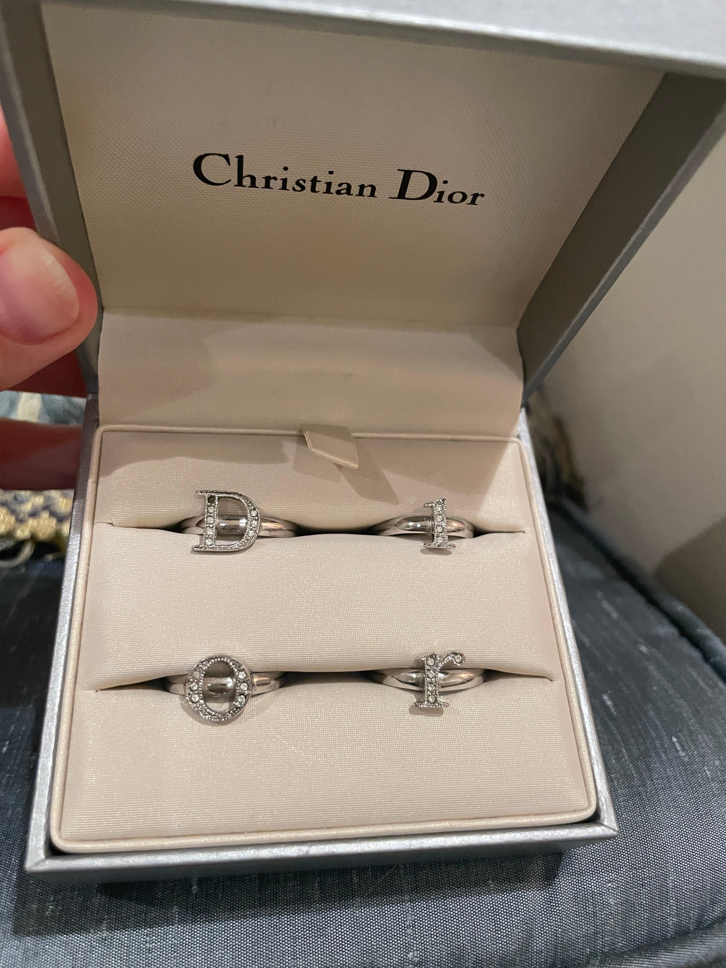 DIOR crystal spell out rings. Vintage Galliano Christian Dior spell out rings! Used vintage condition. 1 rhinestone is missing from the D as pictured (but that's nothing a Swarovski crystal plus some glue can't fix). These are silver and adjustable.