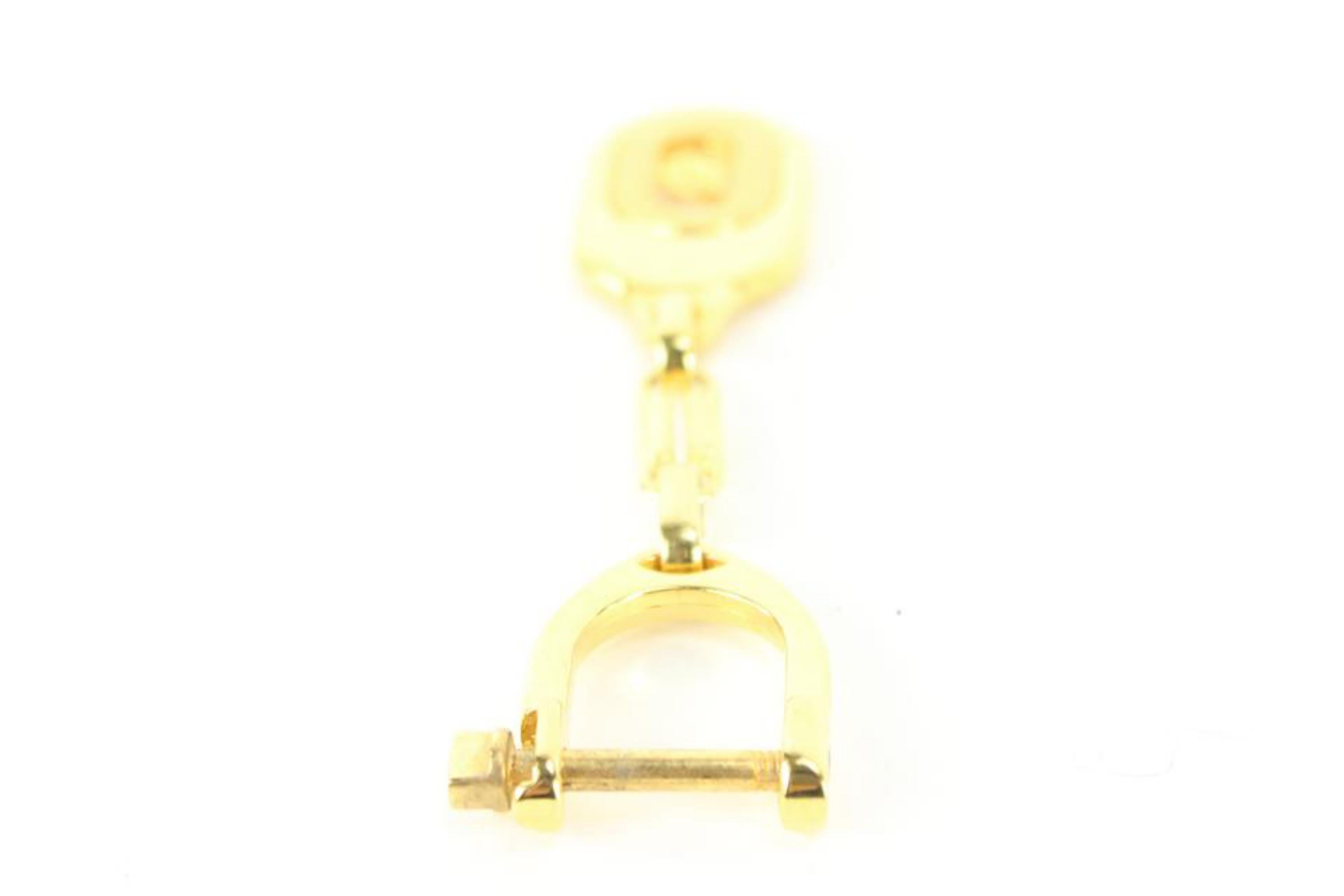 Dior Pendentif porte-clés logo en or 70d429s en vente 5
