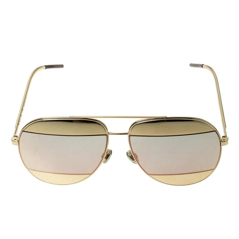 From their Split 1 collection, these aviator sunglasses by Christian Dior are the perfect style accessory for all your outdoor plans. They come in a gold-tone metal body with metal inserts in the lenses and the signature logo CD on the