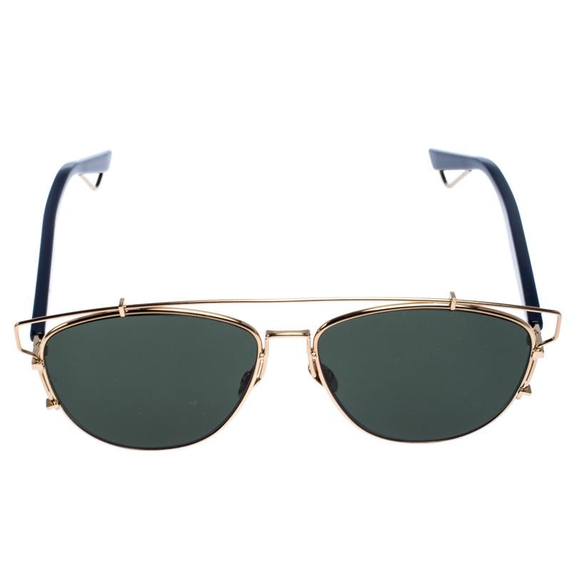 Dior never fails to create lush accessories, and these aviator sunglasses are no exception. These Technologic sunglasses are a classic pair with an edge. They are crafted from acetate and gold-tone metal and feature green lenses. The hinges carry