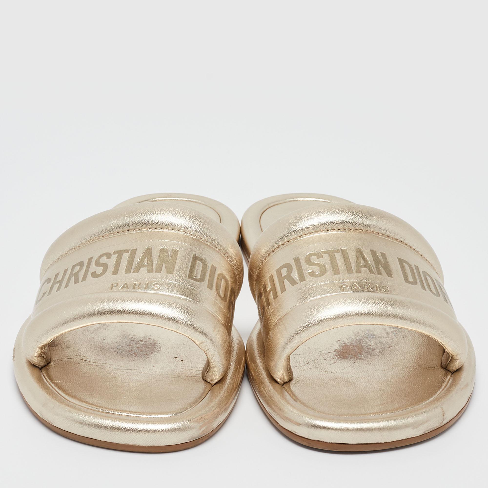 How can one not be smitten by these stunning slides by Dior! In a magical blend of luxury and high-fashion, the flats come designed with CHRISTIAN DIOR straps and the sturdy outsoles add the perfect finishing touch to the pair.

Includes
Original
