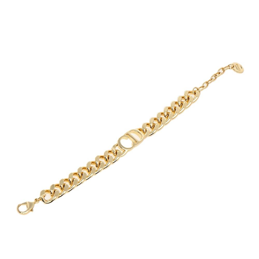 Add a statement finish to your outfit of the day with the Dior bracelet. Created to be fashionable regardless of the season, the gold-tone metal bracelet has a chain design centered with the CD logo and a round label charm.

Includes: Original Box,