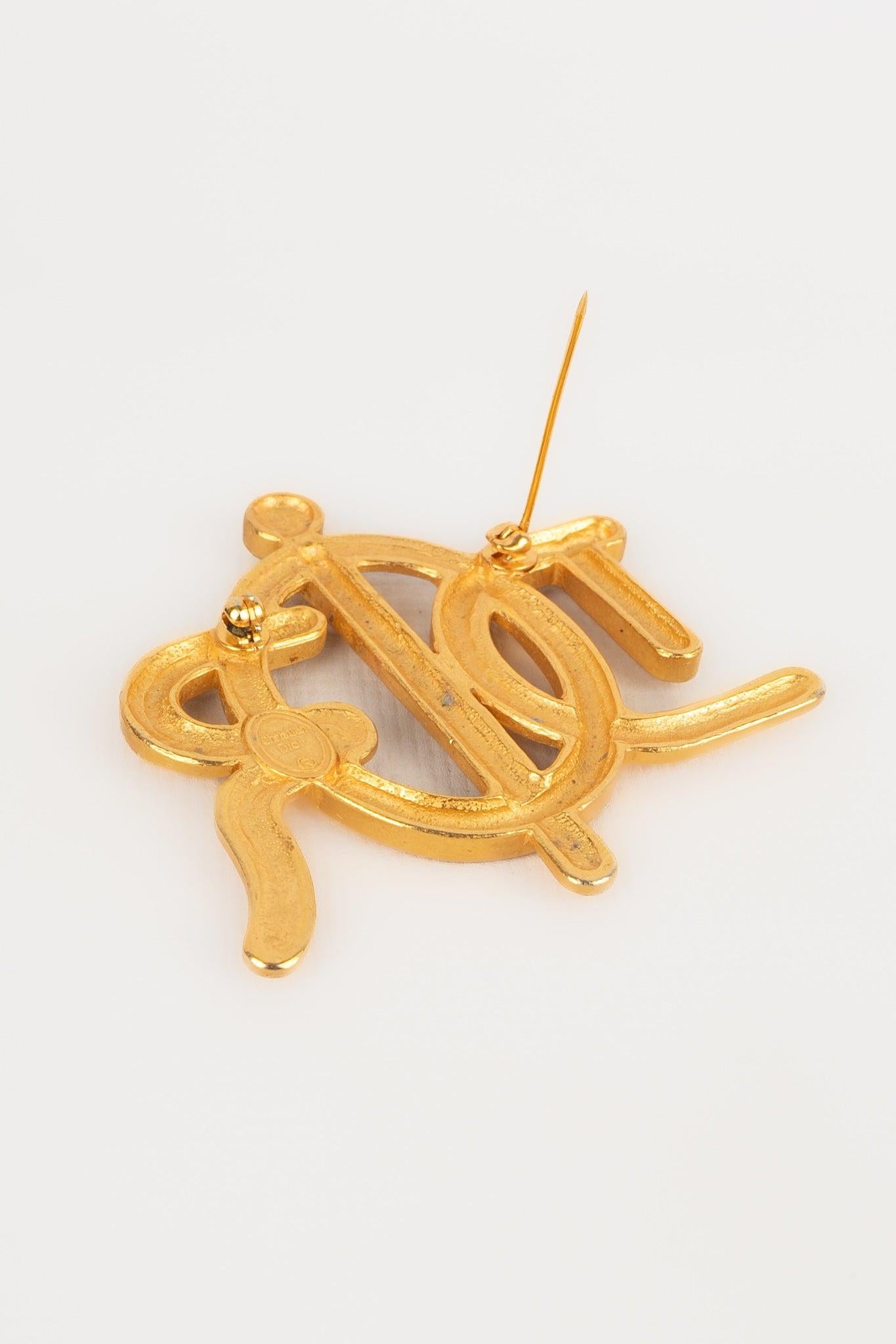 Goldene Metallbrosche von Dior 2