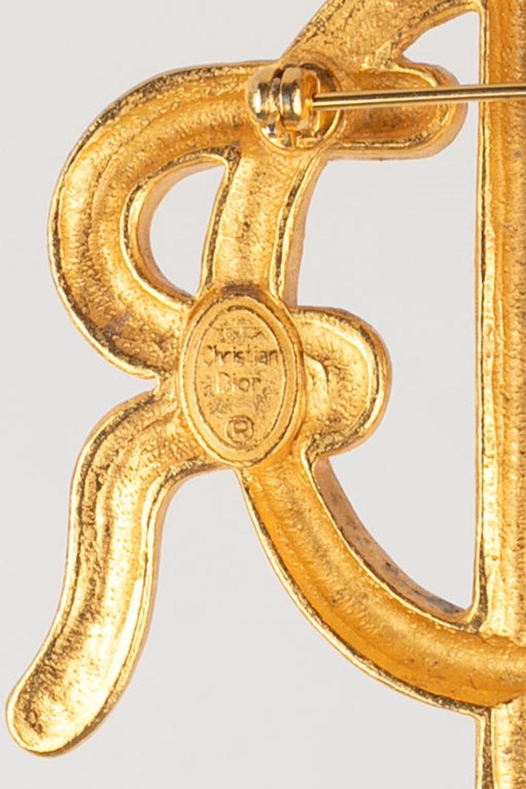 Goldene Metallbrosche von Dior 3