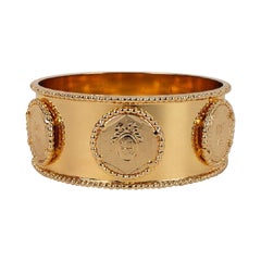 Dior Bracelet rigide en métal doré