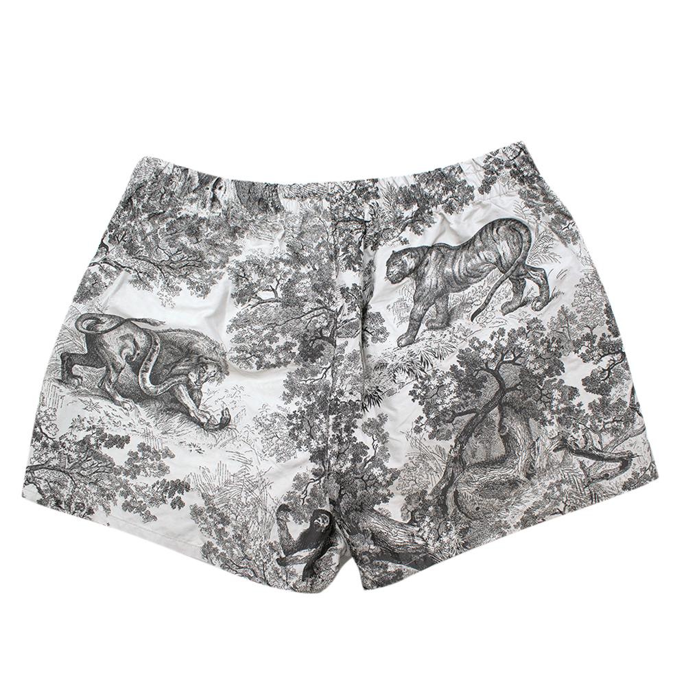 Christian Dior Wildlife Printed Shorts

- Elasticated waistband
- Zip outer pockets
- Detachable logo keyring on pocket
- Lightweight

Materials
100% Polyester

Dry Clean Only

Made in Italy

Approx.
Length 32cm 
Waist 38cm