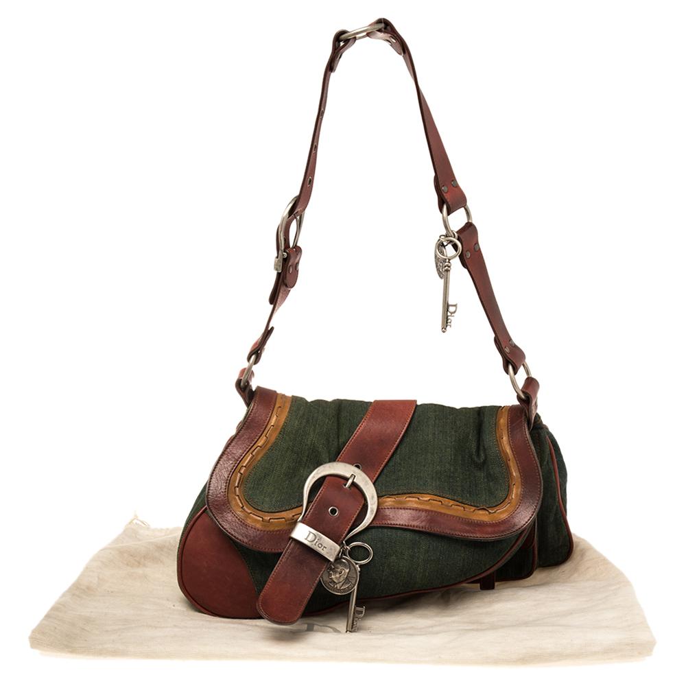green leather saddle bag