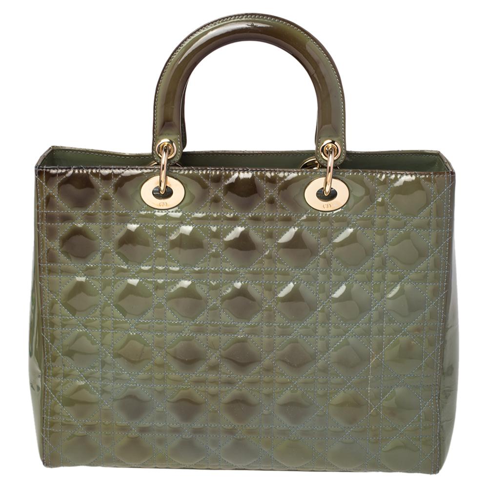The Lady Dior tote is a Dior creation that has gained recognition worldwide and is today a coveted bag that every fashionista craves to possess. This green tote has been crafted from patent leather and it carries the signature Cannage quilt. It is