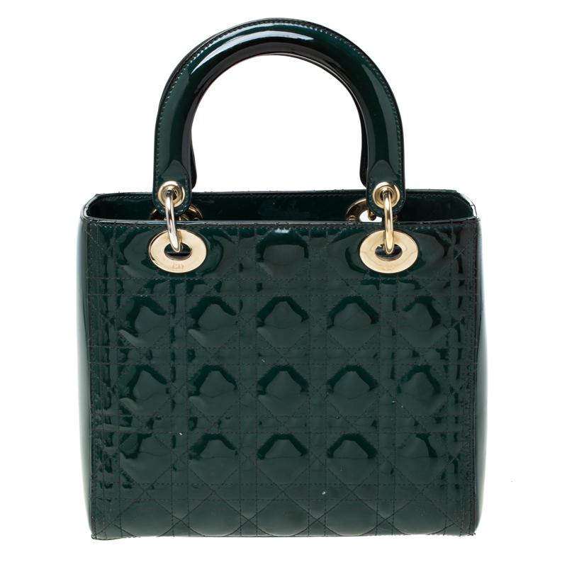 The Lady Dior tote is a Dior creation that has gained recognition worldwide and is today a coveted bag that every fashionista craves to possess. This green tote has been crafted from patent leather and it carries the signature Cannage quilt. It is