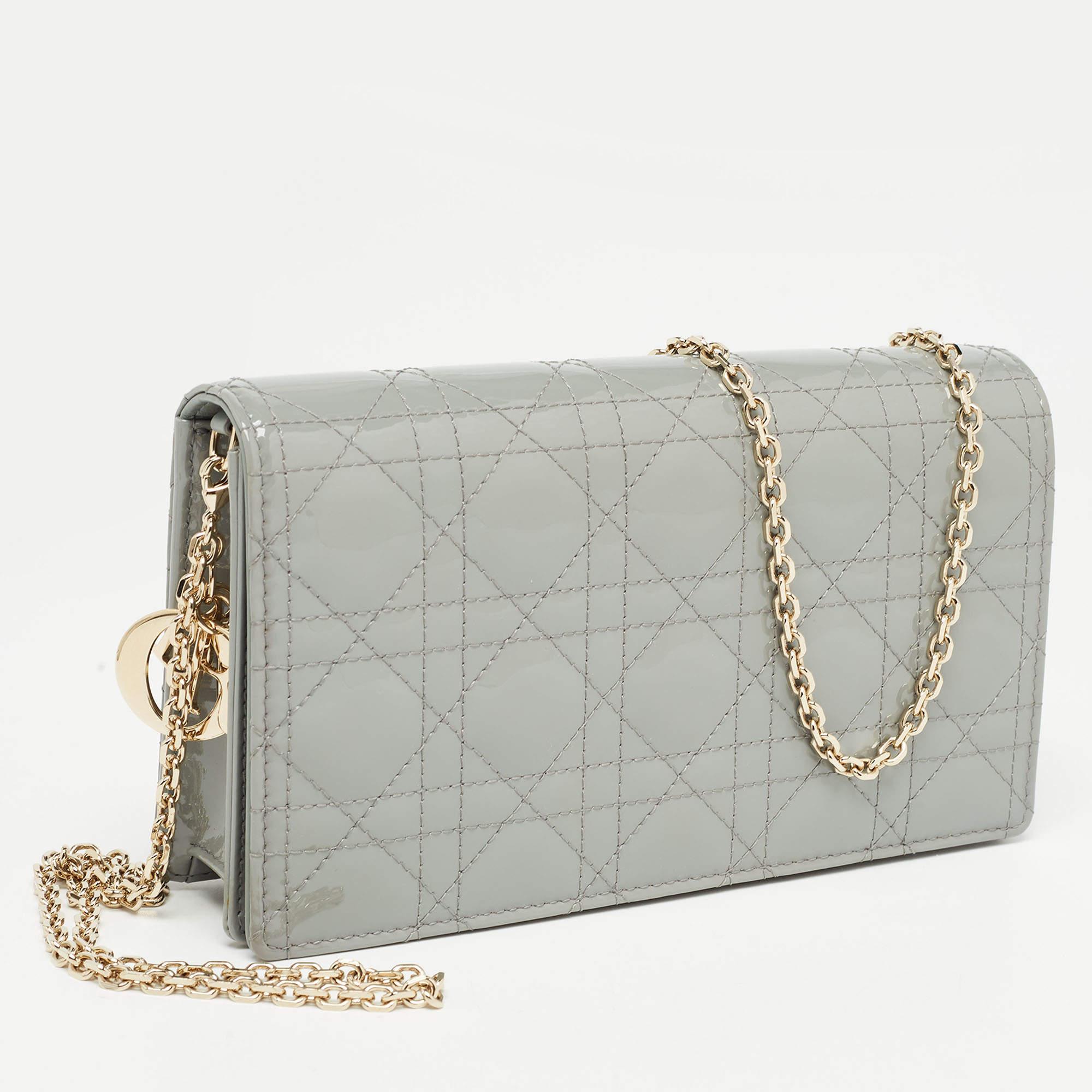 Due to detailed and innovative designs, Dior has managed to be at the top of fashion's hierarchy through the years. Infuse the signature aesthetics of the brand into your outfit by accessorizing it with this Lady Dior pouch. With a classic design,