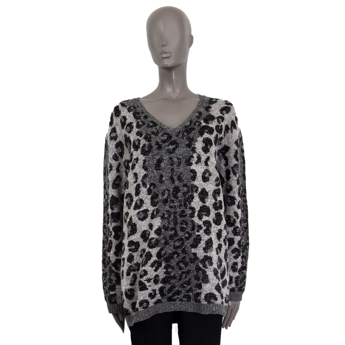 Christian Dior oversized v-neck leopard knit sweater in grey, light grey and black cashmere (80%) silver lurex in polyester metal (7%), viscose (7%) and polyamide (6%). Has been worn and is in excellent condition. 

Tag Size 40 
Size M
Shoulder