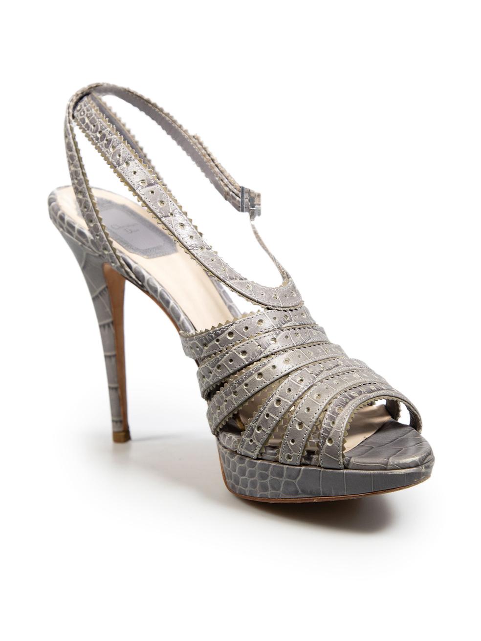 CONDITION is Very good. Minimal wear to the shoes is evident. There are abrasions on the front tip, heel and rear of the shoe. There is a small separation between the insole and the main body of the shoe and the right shoe has mild discolouration on