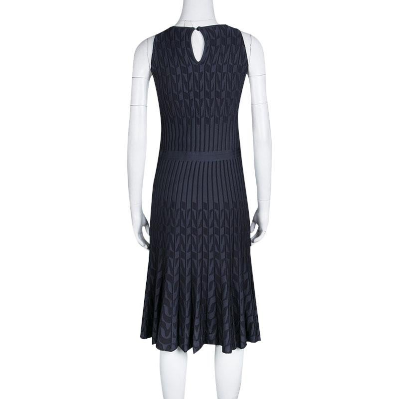 How pretty is this dress from Dior! It has been knit from the finest materials and designed in grey patterns as a sleeveless. The dress has a fit and flare style, with a fitted waistline and a flared skirt.

Includes: The Luxury Closet Packaging

