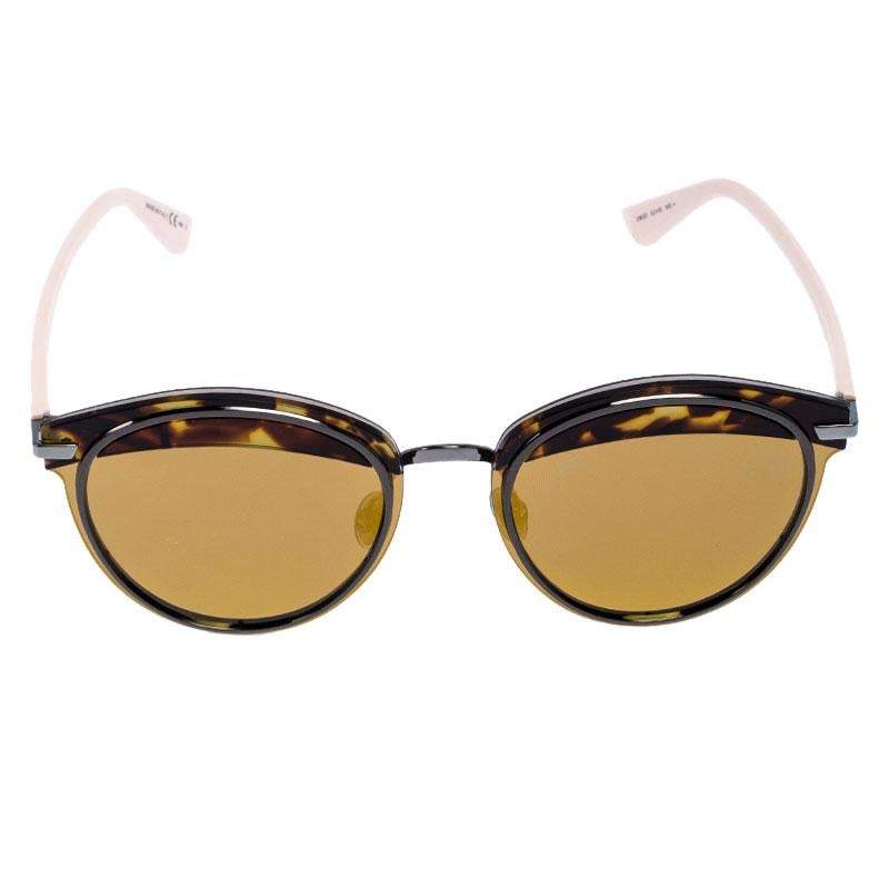 Coming from the house of Dior, these sunglasses feature a stunning round silhouette. It is designed in a Havana brown frame and comes fitted with silver-tone metal. It has mirrored lenses and signature accents on the side.

Includes: The Luxury