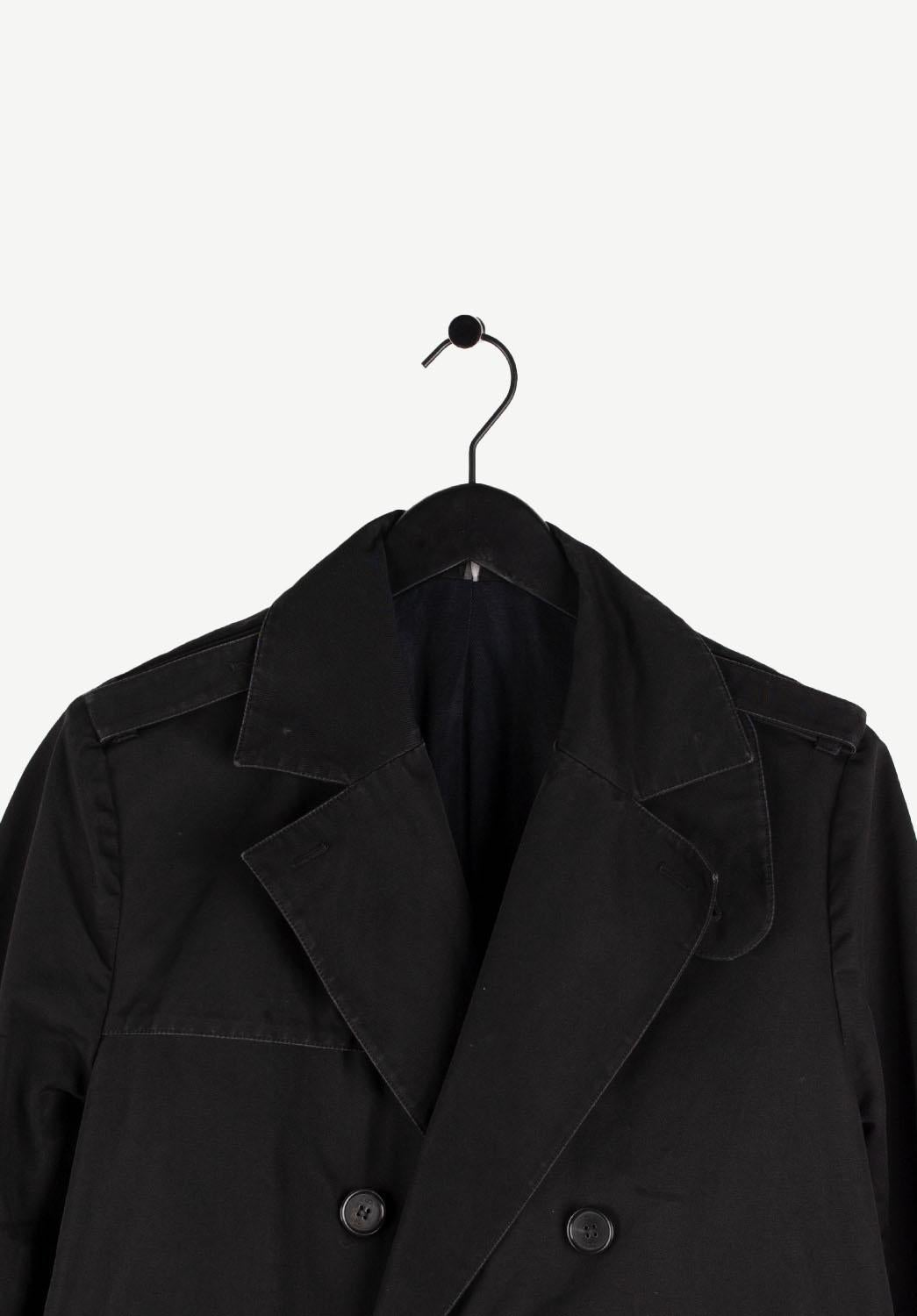 Item for sale is 100% genuine Dior Homme AW03 Men Trench Coat S075
It looks like it has two belt loops but belt is not present with the coat.
Color: Black
(An actual color may a bit vary due to individual computer screen interpretation)
Material: