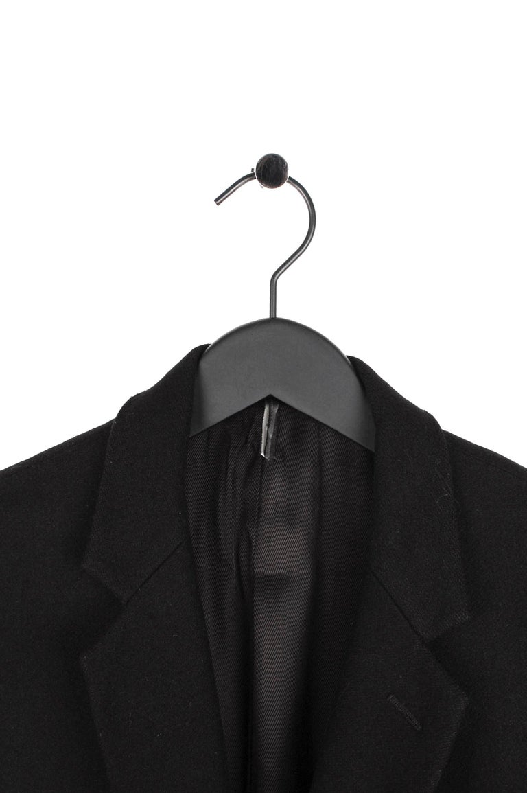 Item for sale is 100% genuine Dior Homme AW09 Wool Coat
Color: Black
(An actual color may a bit vary due to individual computer screen interpretation)
Material: 80% wool, 20% nylon
Tag size: 48IT(M) slim fit.
This coat is great quality item. Rate
