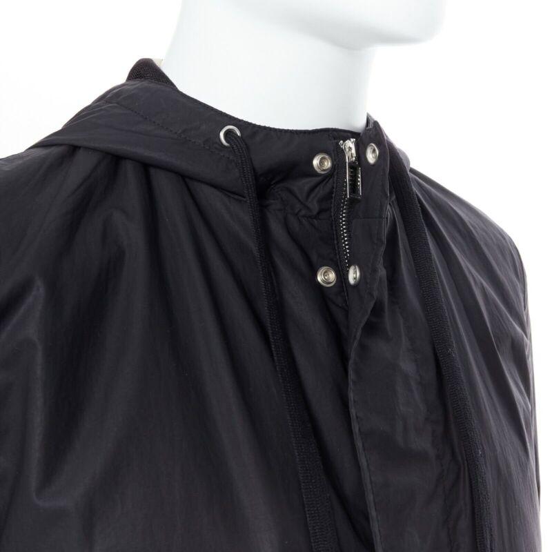 DIOR HOMME black hooded utilitarian drawstrings zipper windbreaker jacket
Reference: CC/AAWG00301
Brand: Dior
Material: Others
Color: Black
Pattern: Solid
Closure: Zip
Extra Details: Hooded windbreaker. Utilitarian jacket. Zipper front closure.