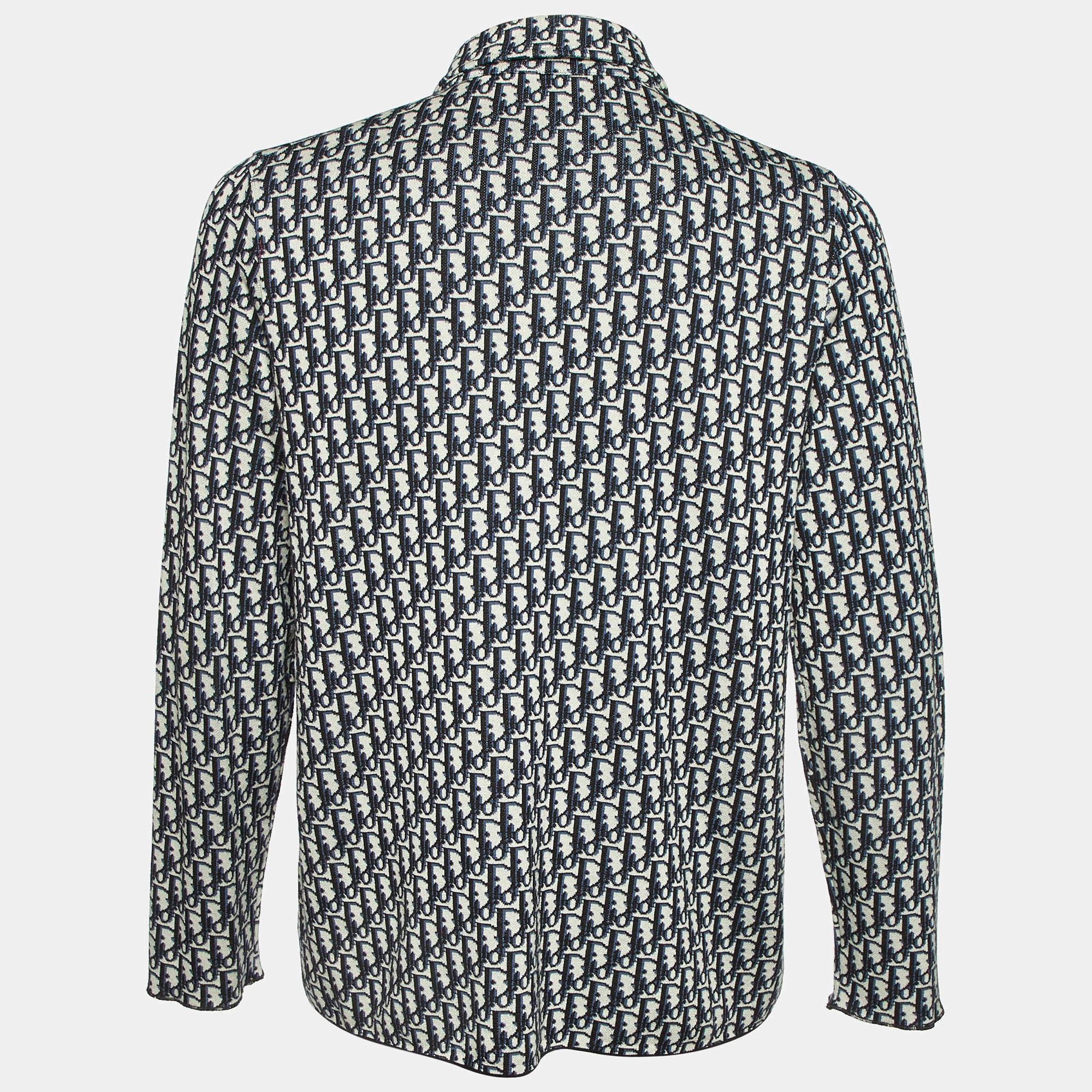 This overshirt features Diorâ€™s iconic Oblique pattern in a deep blue jacquard knit  adding both texture and subtle sophistication to the design. With its relaxed yet structured silhouette  this versatile overshirt can be styled as a light jacket