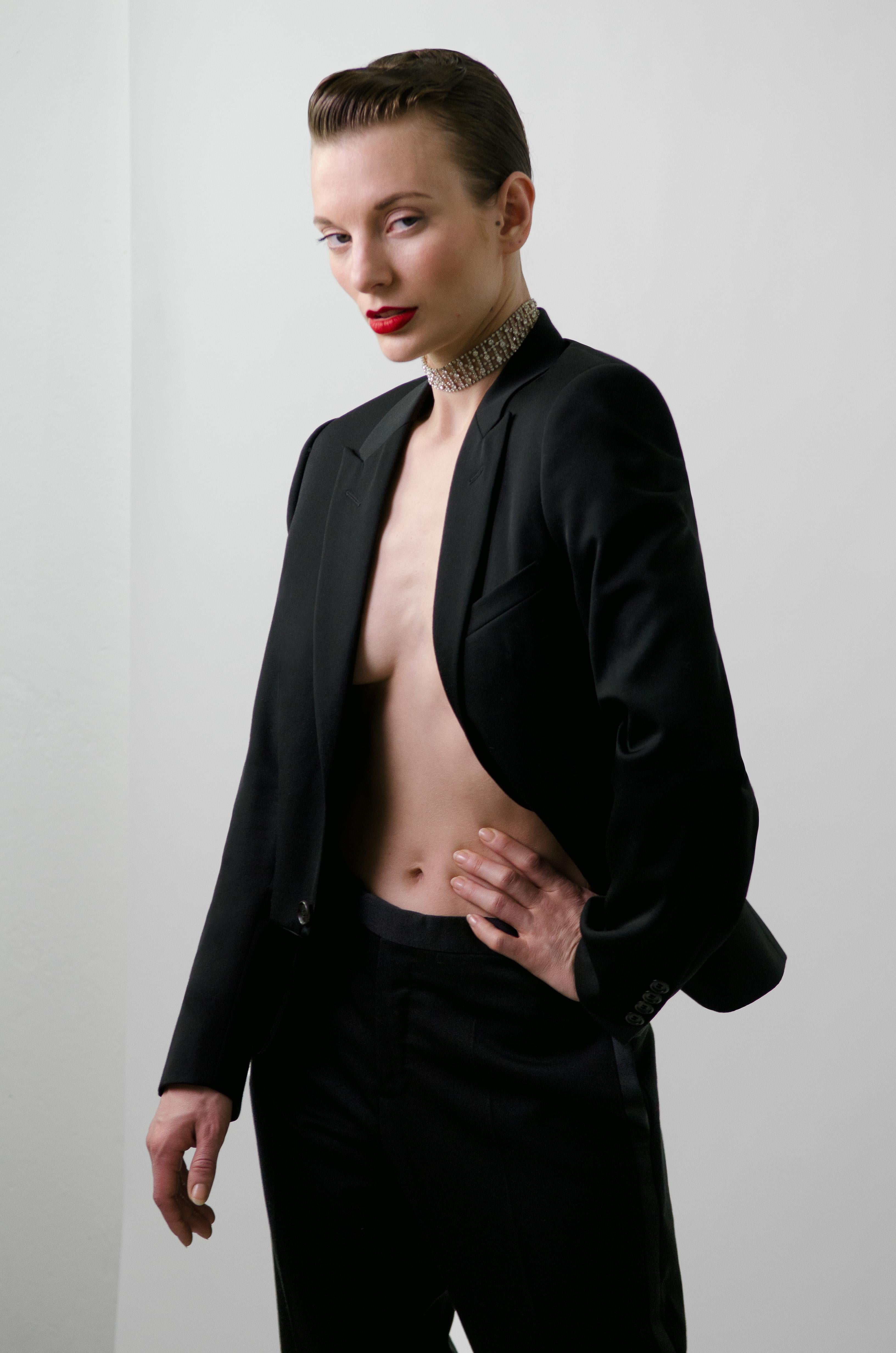 Dior Homme by Hedi Slimane Spring Summer 2007 satin detail tuxedo style suit

Brand: Dior Homme
Designer: Hedi Slimane
Collection: Spring Summer 2006
Fabric: Wool / Satin. Lined in Bemberg.
Color: Black
Size:  46

Rare Dior Homme suit designed by