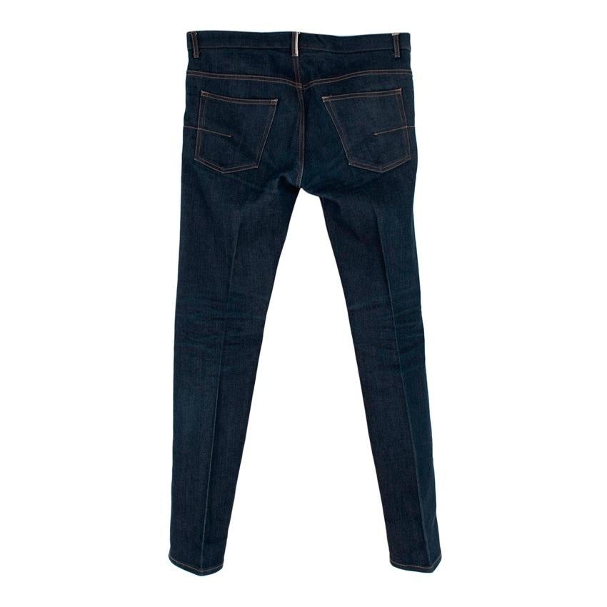 Dior Homme Dark Indigo Straight Leg 5 Pocket Jeans

- Mid-weight classic straight leg jeans
- 5 pockets, metallic trim to small front pocket and back belt loop 
- button fly & hook closure
- contrast stitching
- single pleat 

PLEASE NOTE, THESE