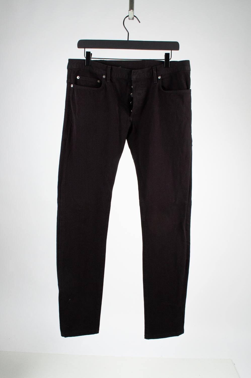 100% genuine Dior Homme Men Jeans, S520
Color: Black
(An actual color may a bit vary due to individual computer screen interpretation)
Material: 55% rayon, 40% cotton, 5% polyurethane
Tag size: W34, Made in Japan
These pants are great quality item.