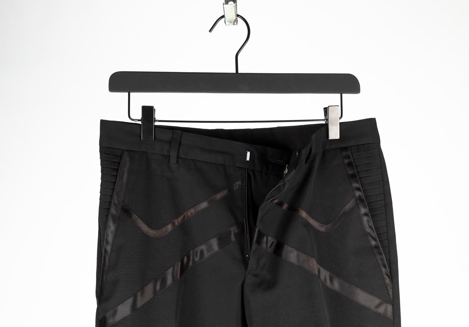100% genuine Dior Homme from SS04 Strip Men Pants.
Color: black
(An actual color may a bit vary due to individual computer screen interpretation)
Material: 67% polyester, 33% cotton
Tag size: ITA 46 (S/M)
These pants are great quality item. Rate 9