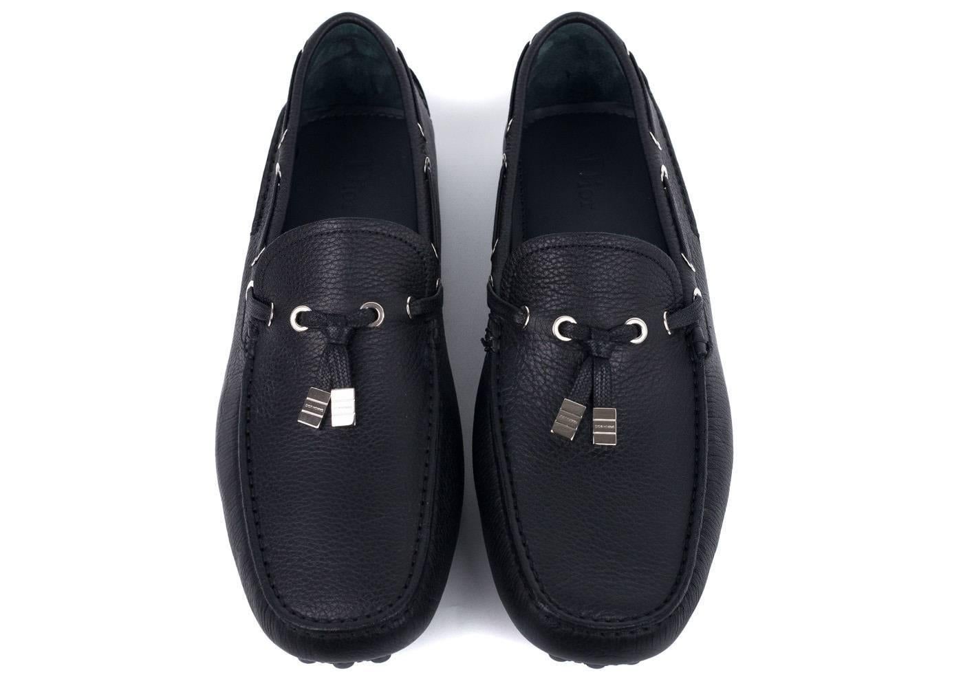 The most exclusive pair of loafers you will find, Dior Homme Black Clafskin Loafer. The French fashion house has redefined the classic loafer introducing a rich slightly pebbled leather, accented by silver hardware grommets and tassle, and a rubber