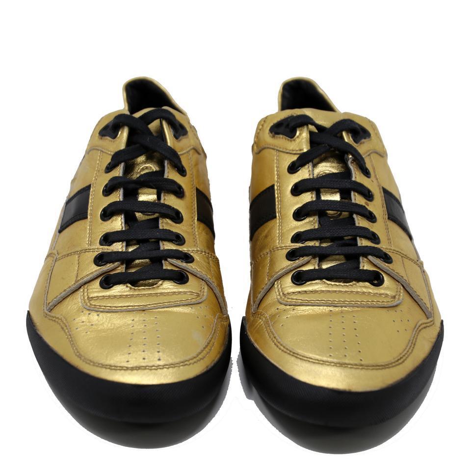 Dior Homme Metallic Low Leather Lace Up Men's Sneakers Size 43.5

These stylish and eye-catching Valentino sneakers are a fabulous addition to any wardrobe! Featuring white and gold leather uppers and hidden laces. A rubber soles create a
