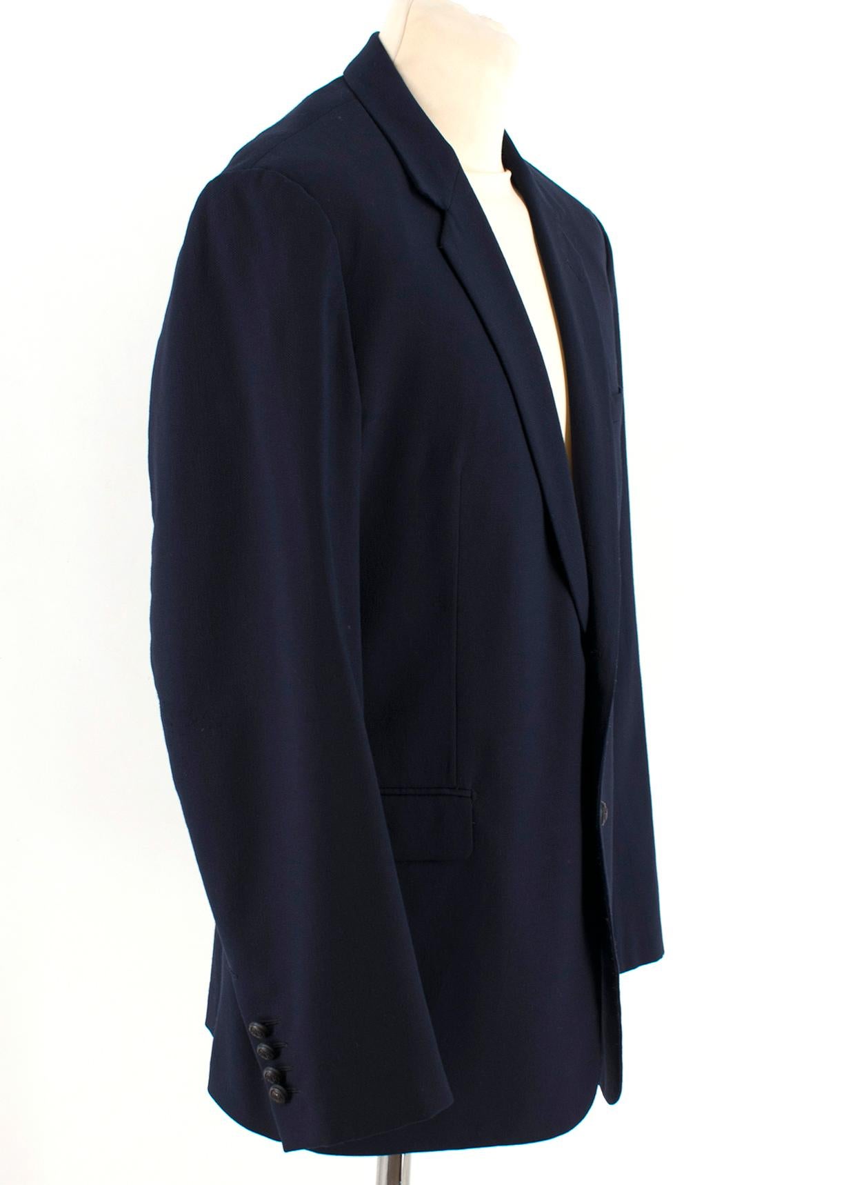Dior Homme Navy Wool Blazer

Blue single breasted blazer jacket,
Long sleeves,
Front flap pockets,
Front chest welt pocket,
Padded shoulders,
Standard notch lapel collar,
Single back vent,
Button up cuffs


Please note, these items are pre-owned and