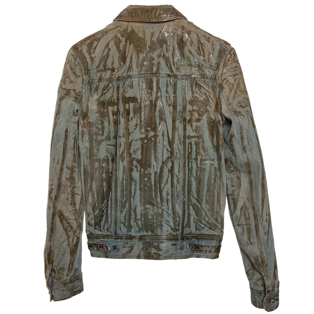 We love this denim jacket from Dior Homme! Made with fashion in mind, the jacket comes in a unique design with a waxed effect all over, full front buttons, and pockets. The stylish number is a must-have for your casual wardrobe.

