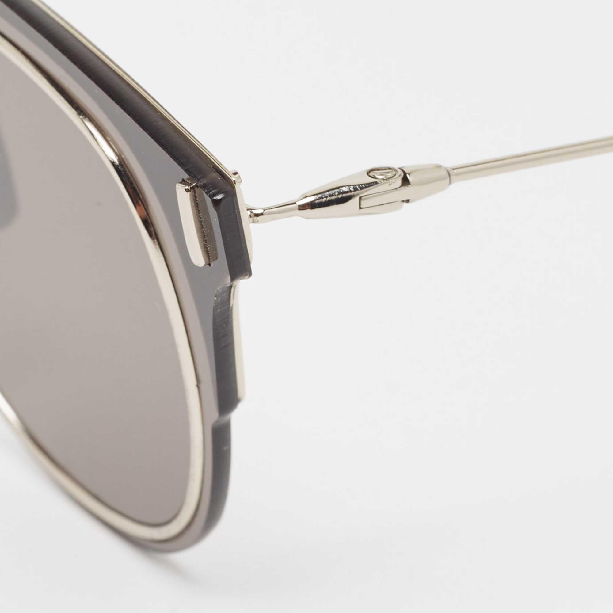 The stylish frame and good-quality lenses make these sunglasses a high-fashion accessory that you must own. Designed by Dior Homme, the pair will look best with your statement outfits.