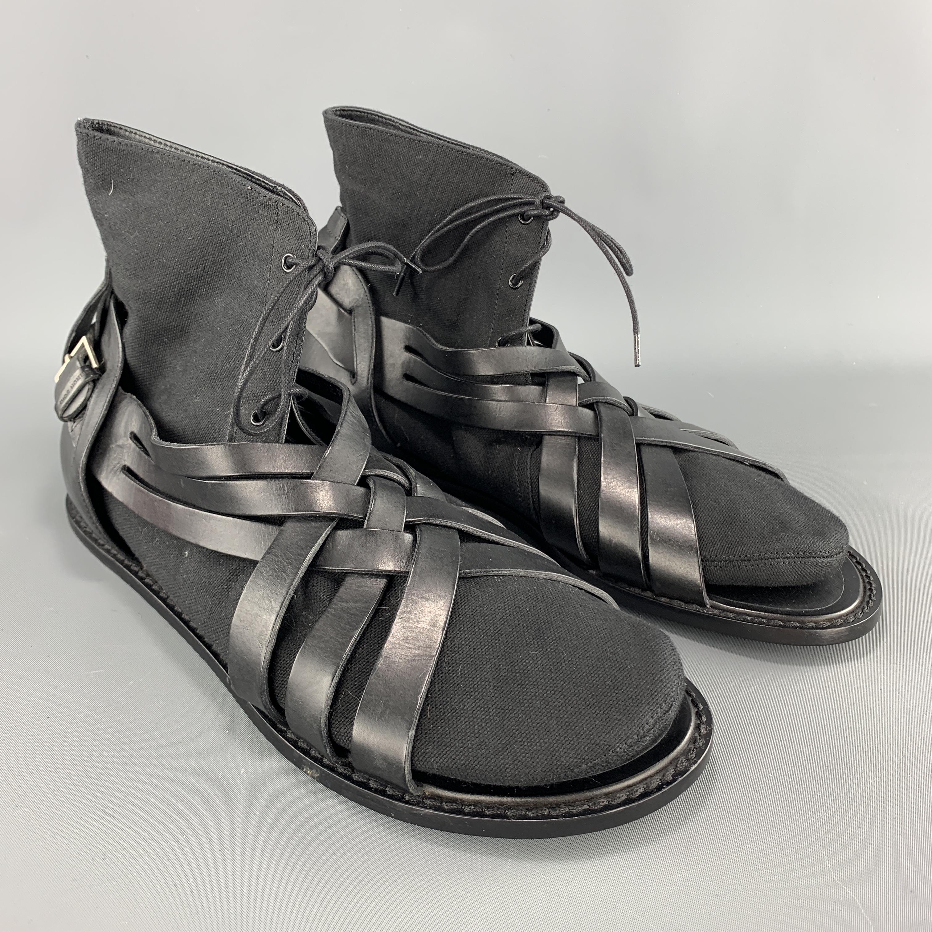 DIOR HOMME shoes feature a black leather woven sandal with canvas sock insert that laces up and attaches with an ankle strap. Made in Italy.

New without Tags.
Marked: IT 45

Outsole: 12.25 x 4.5 in.