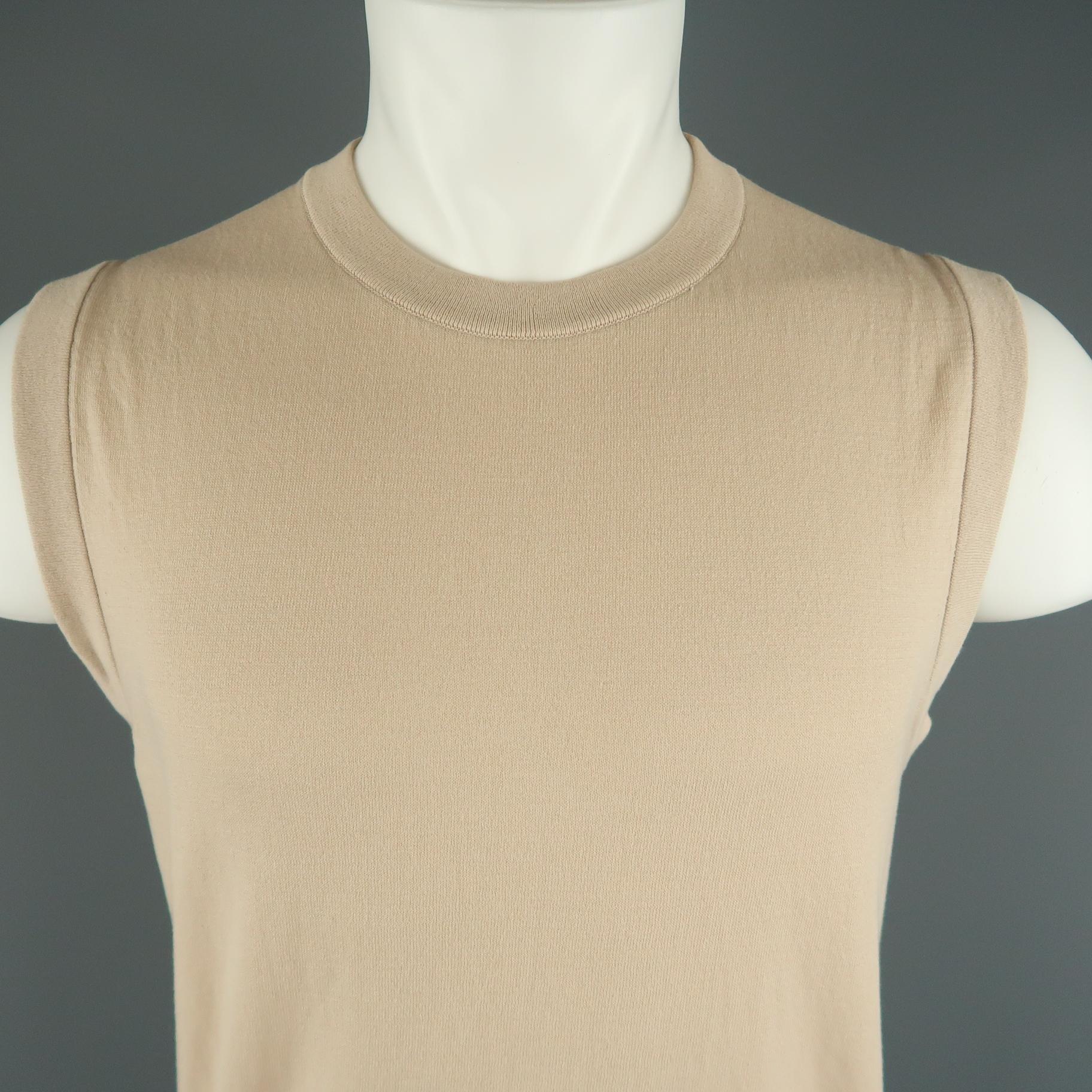 DIOR HOMME vest comes in a peachy beige wool blend knit with a crewneck and signature back stitches. Spring/Summer 2013. Made in Italy.
 
Excellent Pre-Owned Condition.
Marked: M
 
Measurements:
 
Shoulder: 16 in.
Chest: 40 in.
Length: 27 in.